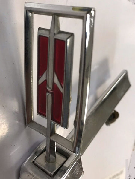 FRONT HEADER PANEL EMBLEM ,USED 78 79 CUTLASS SUPREME