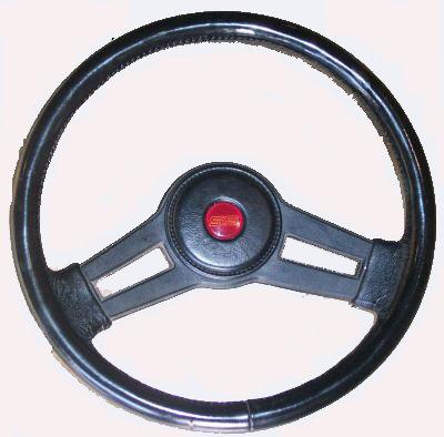 STEERING WHEEL ASSEMBLY, SS, 85-8 MC, BLACK, w/SS HORN CAP, USED